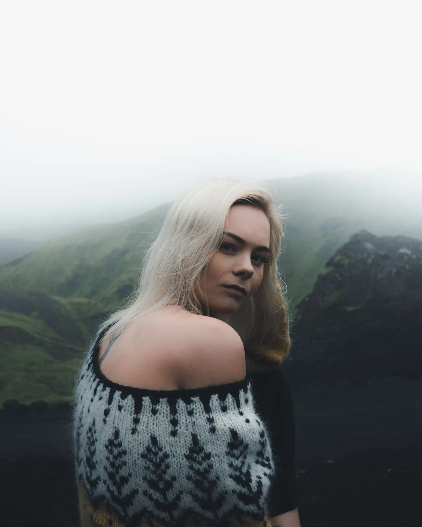 Portrait in a knitted sweater under Icelandic fog